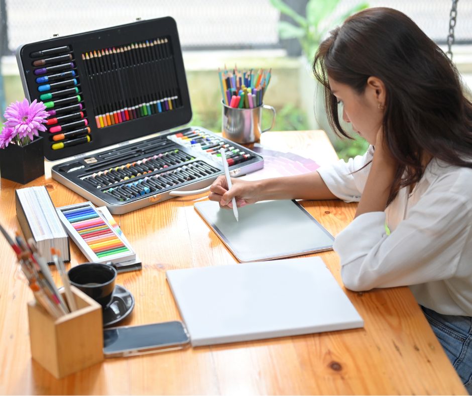 Person Using Apple Pen to Sketch