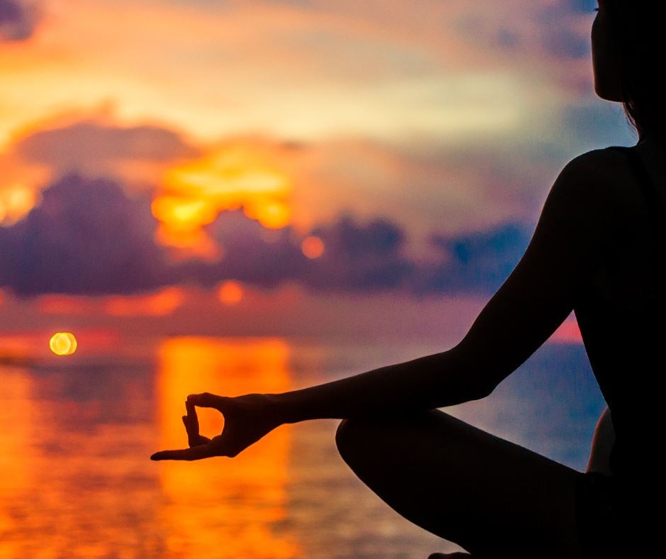 Person Meditating at Sunrise